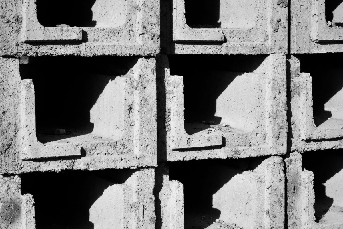 Textured concrete blocks in bright sunlight